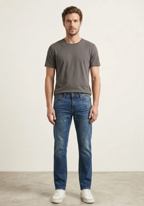 Jeans de mezclilla para hombre en lavado doble stone corte slim fit, pantalón azul con efecto desgastado natural, Sherman Morgan.