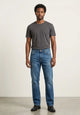 Jeans de mezclilla para hombre en lavado stone corte slim fit, pantalón azul con efecto desgastado natural, Sherman Morgan.