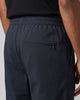Pantalón casual slim fit azul marino con cintura de cordones para hombre detalle de bolsillo trasero