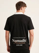 Polo oversize negro, bordado Nomadic Paradise en espalda baja
